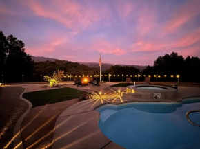 Stunning views with pool, spa, firepit, game court and BBQ